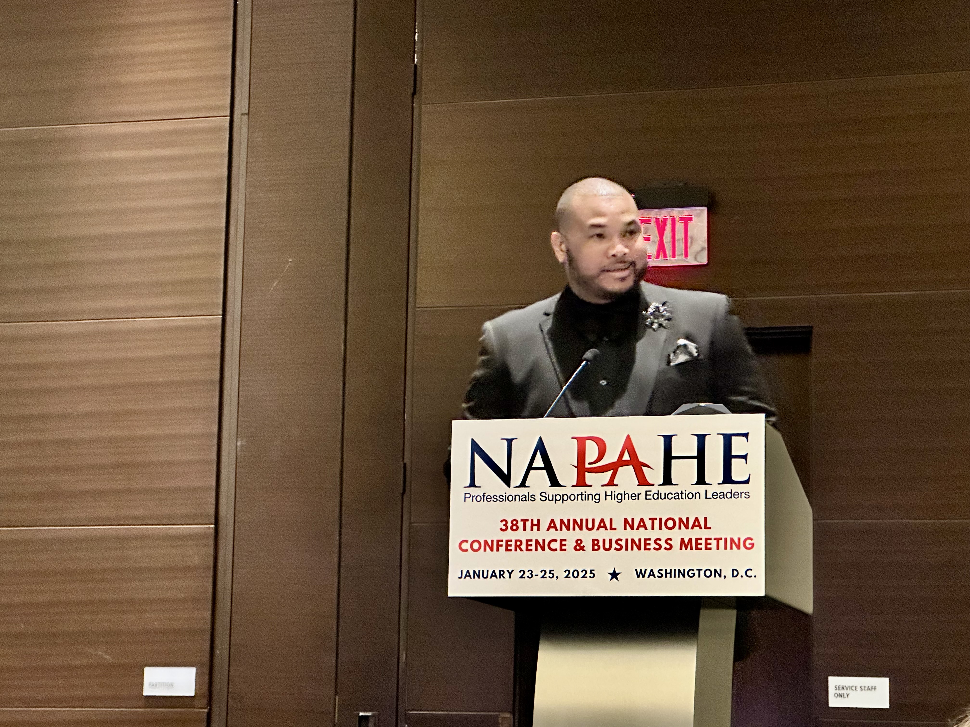 Dr. Adriel A. Hilton speaks to NAPAHE Conference Attendees after receiving the 2025 Award for Professional Achievement.